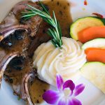 Enjoy lamb chops in our main dining room.